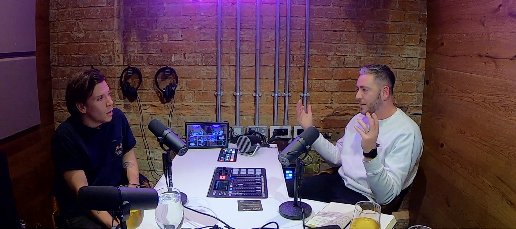 An image of Luke Evans running a podcast interview for YouNeek Productions